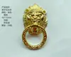 Característica maçaneta antiga cabeça de leão liga torneira caixa de vinho pequena alça porta de casa grande faixa de porta dourada caixa de couro Chá