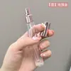 En stock venta al por mayor botella de perfume cilíndrica de vidrio de 10 ml botella para decantar portátil de viaje botella rociadora cosmética