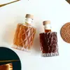 Botella de vidrio para café de extracción en frío creativa y hermosa botella pequeña de vino sellable práctica botella vacía para subempaquetado de vino de frutas casero