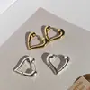 Pendientes de Hebilla para Oreja con Forma de Corazón Chapados en Cobre Oro Real Nicho de Alta Gama Simples Ondulados Irregulares en Forma de Arco Pendientes para Mujer