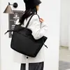 Bolso Tote para Mujer 2026 Estilo Nuevo Simple Versátil Gran Capacidad Bolso de Hombro para Viajes al Trabajo Bolso de Mano para Estudiantes Clase Bolso de Nylon