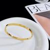 Pulsera de acero inoxidable con placa de luz dorada K Arc de Triomphe 2023 nueva moda letras simples pulsera de acero inoxidable versátil