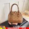 Popular bolsa europea y americana vintage de concha floral, bolso de mano versátil de alta gama, moda transfronteriza 2026, bolso de hombro, bolso cruzado para mujer