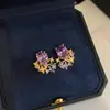 Pendientes de botón ovalados de circón dulces y frescos con un diseño único, cadena para la clavícula de personalidad nicho, conjunto de joyería de lujo ligero y de alta gama