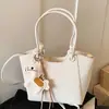 Bolsos de diseño de nicho transfronterizos para mujer 2026 nueva moda versátil bolso cubo para mujer bolso de hombro único bandolera de moda