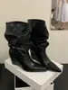 Botas apiladas plisadas adelgazantes de pierna ancha estilo retro Chuyuji para mujer, nuevo modelo 2026, punta fina, tacón de cuña, elegantes botas plisadas de media pantorrilla