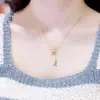 Tienda de Oro Puzuo Mismo Estilo Oro Arena Hombre Pequeño Cintura Torre Eiffel Un Collar Cadena Ligera de Lujo Nicho para Clavícula para Novia