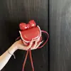 Nueva Bolsa para Bebé Niña Niños Moño de Encaje Mini Bolsos Cruzados de Nicho Bolso de Accesorios Exquisitos de Princesa