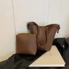 Moda Transfronteriza Versátil para Viajes Diarios Bolso Cubo de Mano para Mujer Verano 2026 Nuevo Casual de Moda Bolso de Hombro Único Cruzado