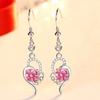 Pendientes de temperamento novedoso con forma de amor pendientes pendientes tendencia de moda amor pendientes de diamantes pendientes pendientes al por mayor