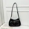 Bolso de hombro y bandolera de alta gama para mujer estilo coreano, bolso de nube plisado trendy ins 2026, bolso baguette vintage para debajo del brazo