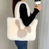 Bolsa de mano de peluche en stock, gran capacidad para otoño e invierno, lindo diseño de conejo, bolso de hombro de peluche