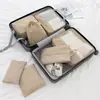 Nova bolsa de armazenamento catiônica à prova d'água de sete peças para viagem bolsa organizadora de bagagem multi-especificação roupa íntima terno portátil