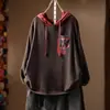 Top de mujer para principios de otoño 2026, nuevo modelo súper estiloso, hermoso diseño de bloques de color estilo coreano, camiseta de punto con capucha de manga larga