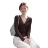 Suéter de punto de cuello redondo con mangas largas retorcidas de rayas verticales para otoño e invierno para mujer, principios de otoño, súper caliente, nicho, estilo único, top