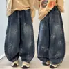 Pantalones vaqueros de pierna ancha para niño, nuevo estilo primavera y otoño, corte holgado, lavados, rotos, pantalones largos casuales, pantalones de moda estilo coreano para otoño