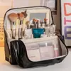 Bolsa de almacenamiento tipo stand-up para cosméticos macaron de viaje, bolsa de maquillaje de viaje portátil, bolsa de aseo impermeable de gran capacidad con compartimentos