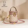 Fábrica de Origen Bolsa Norte Bolsa Cilindro Bolso de Hombro para Mujer Nuevo Estilo Retro Europeo y Americano Bolso de Mano Bolso Cruzado para Mujer