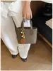 Estilo Melard ante retro colección otoño/invierno 2026: un bolso de hombro, bolso cruzado y bolso de mano elegante y sofisticado, perfecto para ir al trabajo