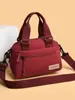 Bolsa Feminina Moderna e Estilosa 2026 Novo Modelo Simples Leve Bolsa de Ombro Versátil Impermeável Nylon Bolsa Transversal Bolsa de Mãe