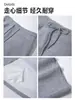 Conjunto esportivo casual de moletom cinza para mulheres, outono 2026, jaqueta super popular para o início do outono, saia curta, conjunto de roupa estilo coreano
