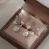 2026 Novos Brincos de Pérola com Design de Nicho, Dupla Face, com Toque de Luxo, Studs de Diamante Brilhantes de Luxo Leve Atacado