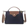2026 Nuevo Modelo Diseño de Nicho Retro Casual Bolso de Hombro Tipo Dumpling Moda de Tendencia Elegante Bolso Cruzado