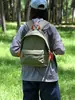 Mochila gruesa resistente al agua de gran capacidad transfronteriza para hombres y mujeres, adecuada para almacenamiento al aire libre, mochilas escolares para estudiantes universitarios y para ir al trabajo.