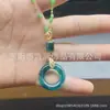 Distribución de plataforma completaColgante de collar de princesa con forma de corazón de gota de agua Ruyi imitación de jade Hetian con un diseño de alta gama