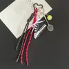 Zapatos Estilo Deportivo Llavero de Tenis Nicho Gama Alta Serie Miu Colgante de Cuerda Trenzada para Bolso Venta al por Mayor