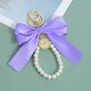 Nuevo Llavero Creativo de Cadena de Perlas con Lazo Colgante de Bolso de Moda para Mujer Llavero de Coche Lazo Personalizado