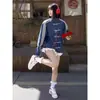 Chaqueta de moda estilo chino con tres rayas y colores contrastantes, con botones de nudo chino tradicional y cuello mao, adecuada para hombres y mujeres en primavera y otoño