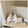 Nova bolsa grande feminina 2026, de alta qualidade, grande capacidade, de pele de carneiro, para o dia a dia, de ombro, bolsa tecida à mão