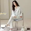 Pijama de algodón puro de manga larga y pantalón largo, estilo cárdigan de otoño nuevo, conjunto de dos piezas de ropa para el hogar de algodón para mujer, moderno