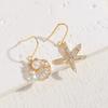 Aretes de Estrella de Mar y Perlas de la Serie Marina de Venta Caliente Transfronteriza, Moda Nicho de Lujo Ligero, Aretes de Cobre Chapados en Oro Real de 14K para Mujer