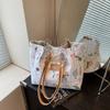 Bolso de Gran Capacidad para Mujer 2025 Nuevo Bolso de Hombro de Tela Estampada de Alta Calidad Nicho Simple Versátil Bolso Tote