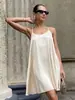 Vestido Cruzado Sencillo con Tirantes Finos Estilo Europeo y Americano Primavera 2026 Nuevo Sexy Espalda Cruzada Satín Corto