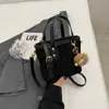 Bolsa de Mão Feminina Estilo Balde Cor Sólida Moda Nova Coleção Outono 2026 Bolsa de Ombro Vintage Casual para o Dia a Dia Bolsa Transversal Tendência