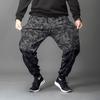 Pantalones Jogger Elásticos Sueltos de Talla Grande para Hombre Estilo Coreano Tendencia Versátil de Nueve Cuartos Casuales