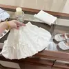 Conjunto de Verão para Meninas 2026 Estilo Miu Top Tricotado Vazado de Manga Curta Saia Curta Floral Estilo Ballet