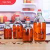 Venda por atacado garrafa de óleo de gergelim garrafa de óleo de vidro transparente 250ml garrafa de óleo de gergelim selada garrafa de óleo de gergelim de grande capacidade com tampa garrafa vazia