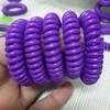Venta al por mayor en fábrica, anillo de mano de resorte de plástico EVA, color, pulsera de aromaterapia para niños, anillo de mano de cable de teléfono QQ