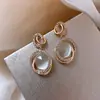 Pendientes Vintage Estilo Francés con Ojo de Gato Incrustado de Diamantes y Perlas, Pendientes de Lujo Ligero de Gama Alta, Exquisitos y Modernos Accesorios para Orejas Versátiles al por Mayor