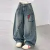 Ropa de Otoño para Niñas Estilo Coreano Pantalones de Mezclilla de Gato de Dibujos Animados 2026 Nuevas Llegadas de Otoño Pantalones Anchos Estampados Súper Elegantes para Niños
