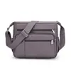 Moda Transfronteriza Simple Bolso Pequeño Cuadrado de Tela de Nylon Repelente al Agua con Múltiples Compartimentos y Correa para el Hombro Bolso Cruzado para Mujer Nuevo 2025