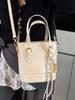 Atacado popular simples moda coreana lazer bolsa balde design de nicho feminino comutador versátil textura bolsa mensageiro
