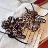 Anillo para el pelo de intestino grueso de flor y leopardo de moda, alto valor de belleza, cuerda para coleta de niña, lazo para el pelo Marubeni explosivo