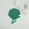 Bonitos y adorables gorros de otoño e invierno para niños, con diseño de poner, material de punto y una serie de dibujos animados, que brindan abrigo y protección para los oídos para bebés y niños pequeños.