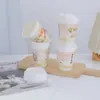 Venta al por mayor de fabricantes Tazas desechables para bebidas calientes de leche de soja, Tazas engrosadas personalizadas con tapas para llevar el desayuno, Empaque para leche de soja y gachas