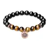 Pulsera de Piedras Naturales Ojo de Tigre y Ónice para Hombre con Amuletos de Flor de Loto en Oro Rosa Joyería Elegante y Simbólica Piedras Naturales Negras y Marrones Pulsera Ajustable para Hombre Regalo Perfecto para Amantes del Yoga o la Meditación